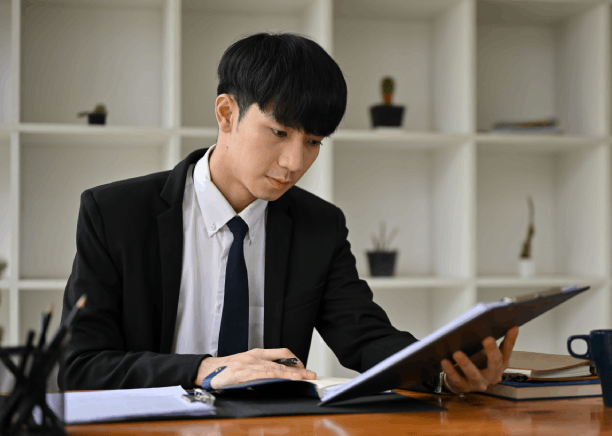 A Houston linguist checks Mandarin and Cantonese text for accuracy with Chinese Translation Services in Houston on a laptop.
