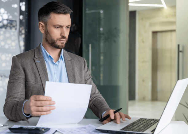 Translator reviewing documents for Certified translation services in Houston price quote with quality.