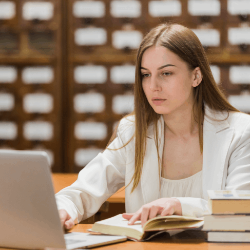 A linguist checks Chinese Translation Services in Houston legal document wording beside a courthouse file.