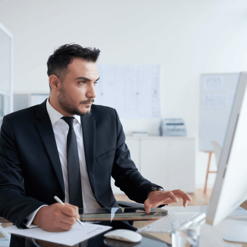 A translator checks a certified USCIS packet at a Houston desk, showing Spanish Translation Services in Houston for filings.