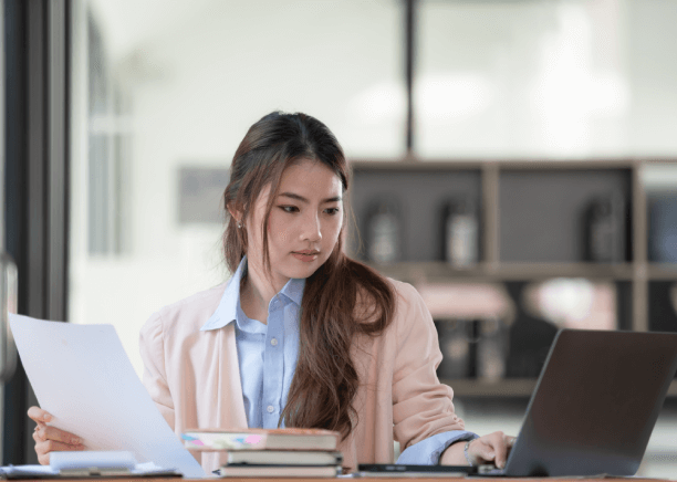 A professional translator completing Certified translation services in Houston for USCIS immigration documents.