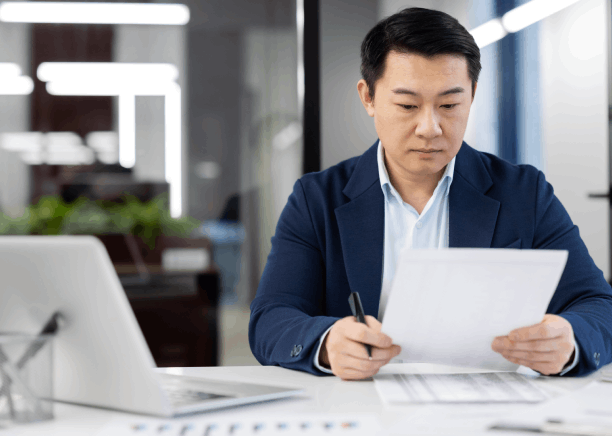 A certified translator signs a USCIS translation certificate in Houston, showing Chinese Translation Services in Houston.